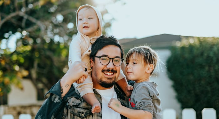 Man and two kids