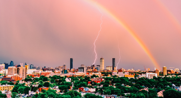 rainbow and lightning over Boston skyline
