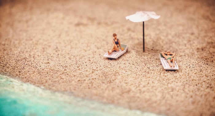 Toy figurines on a beach setting