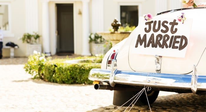 car with a sign that reads Just Married