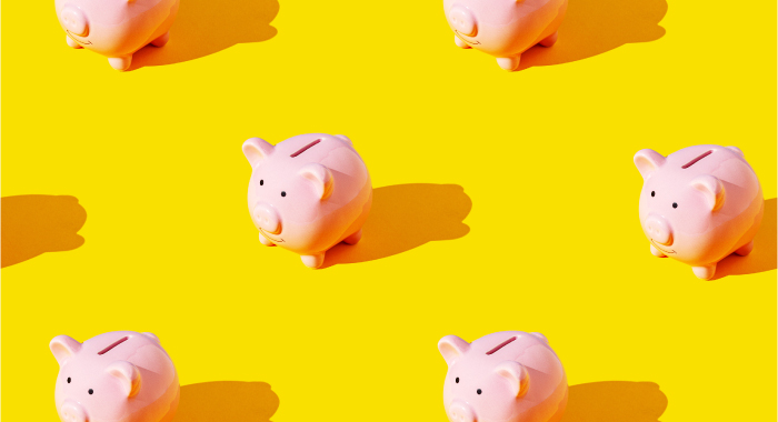 Piggy banks on a yellow background