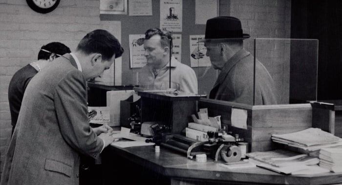 Tellers at the bank, black and white picture