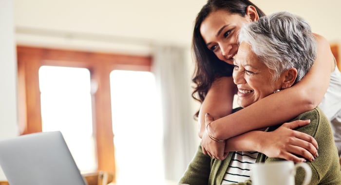 elder person with their caregiver